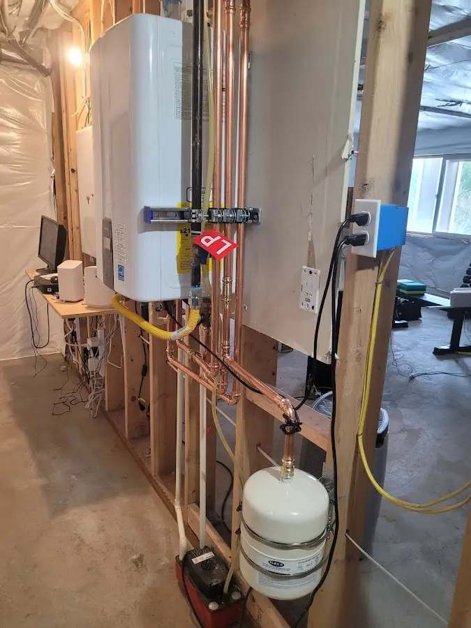 Licensed plumber repairing a kitchen sink in Marksville